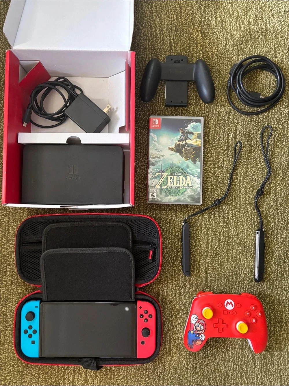 Nintendo Switch OLED with Mario Pro Controller plus Zelda Tears of the Kingdom